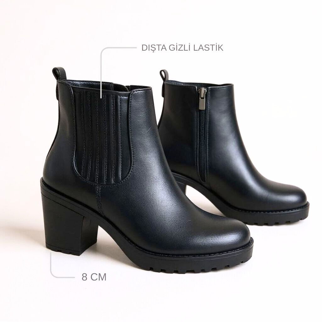 Siyah Hakiki Deri Lastik Detaylı Kadın İçten Fermuarlı Bot